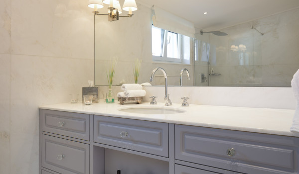 A dressing table and a large mirror in the bathroom of the luxury Dalmatia villa Primosten Glamour for rent and vacation