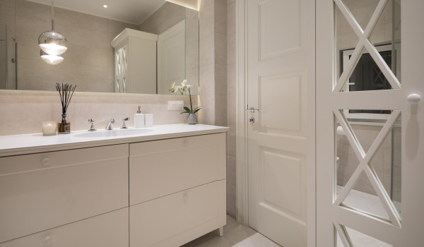 Chest of drawers with sink and mirror in bathroom of modern family villa Primosten Glamour with private pool
