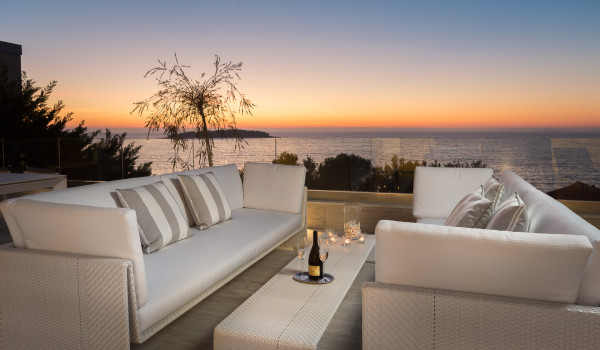 Comfortable sofas on the outdoor terrace of Croatia luxury holiday villa with concierge services in Primosten