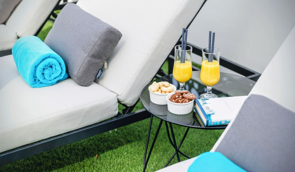 Luxury beachfront villa for rent with 2 pools - deck chairs by the  heated pool