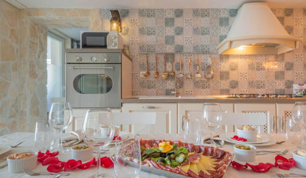Luxury Beachfront pet friendly villa in Trogir - ground floor of the villa with kitchen, dining area, mobile grill and bathroom