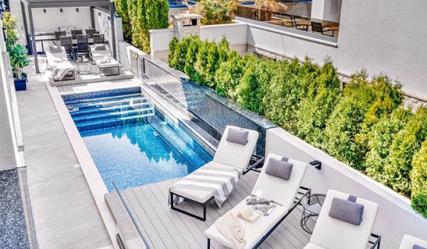 Luxury Beachfront pet friendly villa for 16 pax in Trogir - outdoor heated pool with hydromassage pumps, counter-current swimming, and a waterfall.