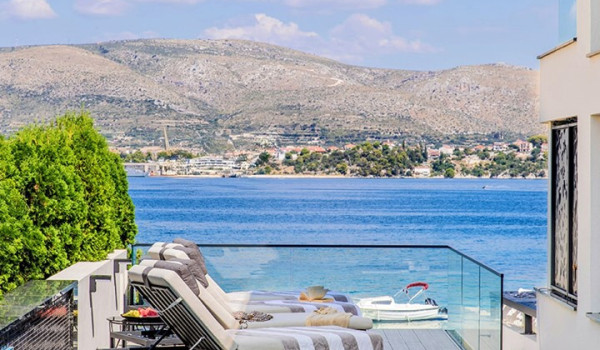 Luxury Beachfront pet friendly villa for 16 pax in Trogir - outdoor heated pool with hydromassage pumps, counter-current swimming, and a waterfall.