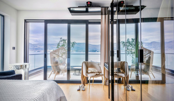 Luxury Beachfront pet friendly villa for 16 pax in Trogir - air conditioned bedroom with king size bed and seaview