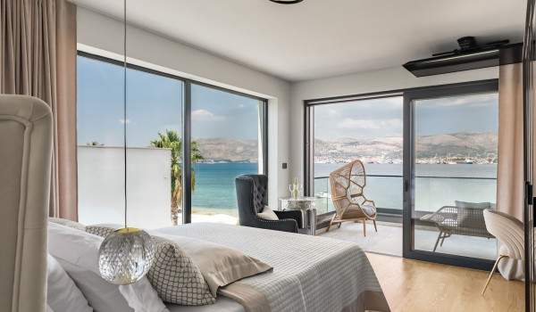 Luxury Beachfront pet friendly villa for 16 pax in Trogir - air conditioned bedroom with king size bed and seaview