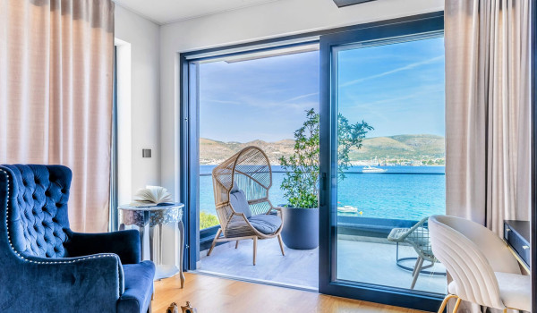 Luxury Beachfront pet friendly villa for 16 pax in Trogir - air conditioned bedroom with king size bed and seaview