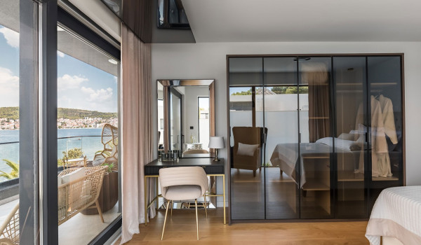 Luxury Beachfront pet friendly villa for 16 pax in Trogir - air conditioned bedroom with king size bed and seaview