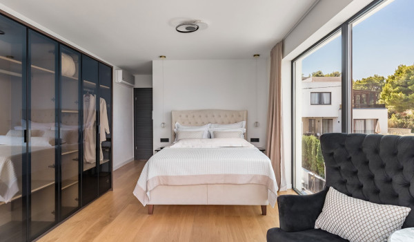 Luxury Beachfront pet friendly villa for 16 pax in Trogir - air conditioned bedroom with king size bed and seaview