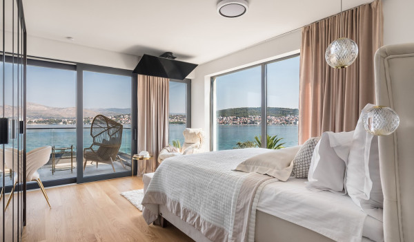 Luxury Beachfront pet friendly villa for 16 pax in Trogir - air conditioned bedroom with king size bed and seaview