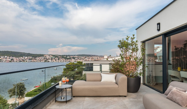 Luxury villa for a family vacation in Trogir - outdoor seating area with sea view