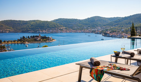 Luxury Villa Vision of Vis with heated pool, parking, concierge service and 5 bedrooms with 5 en suite bathrooms for 10+5 people.