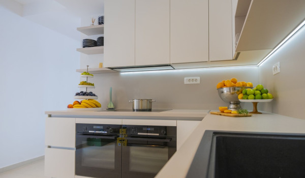A modern kitchen in a luxury rental holiday villa with a private pool in Brela