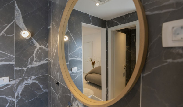 A mirror in a modern bathroom in a Croatia rental luxury villa by the sea in Brela