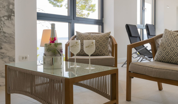 Champagne served on the table in a luxurious villa overlooking the sea Glorious Brela in Brela