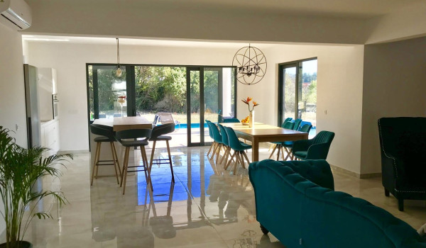Open space dining and living room in the luxury vacation villa for families with kids near Dubrovnik
