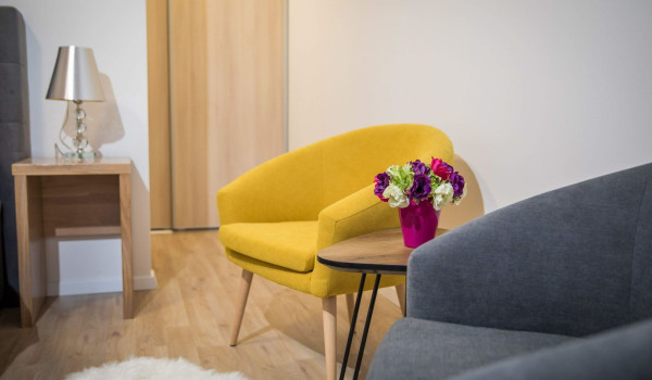 Seating area in a bedroom of a luxury villa Quiet Land with private pool and badminton court near Dubrovnik